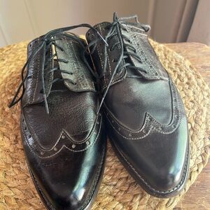 Bed Stu Black Leather Matilda peenyloafer mules.